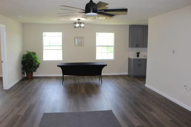 a view of a livingroom with furniture window