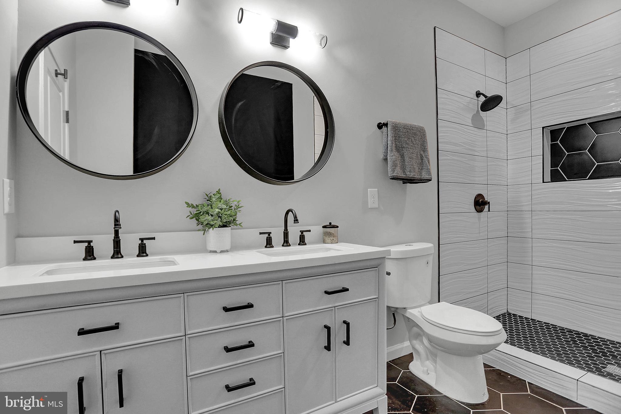 1219 North Eden Street Baltimore, MD 21213 - Photo 14 of 36 His & Her vanities in Master Bathroom