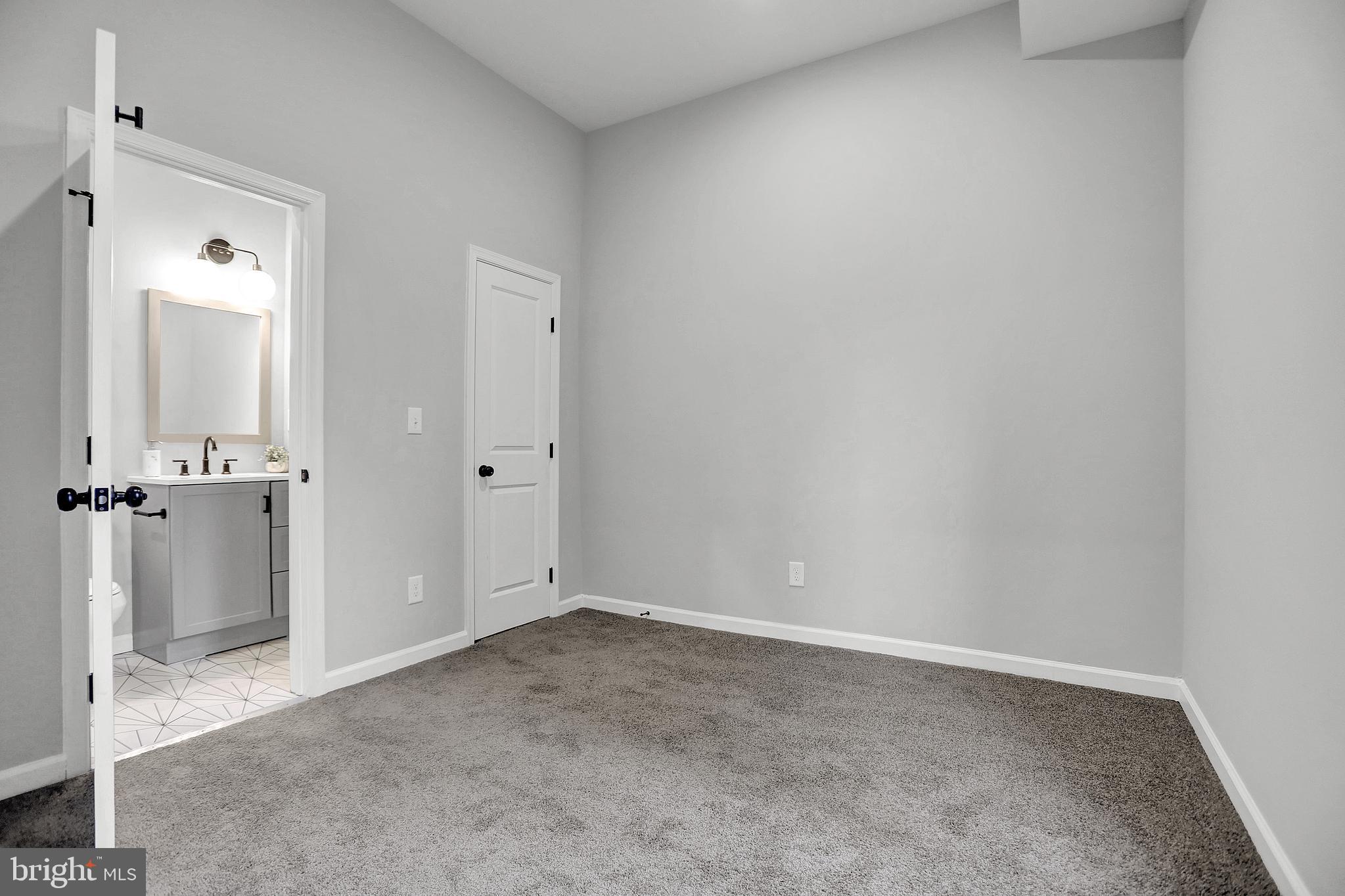1219 North Eden Street Baltimore, MD 21213 - Photo 25 of 36 1st Floor master Bedroom