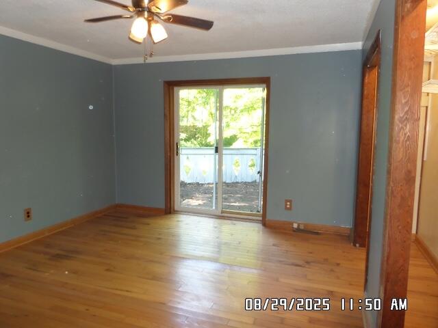 67 Brookledge Lane Rocky Mount, VA 24151 - Photo 22 of 29 an empty room with wooden floor and fan