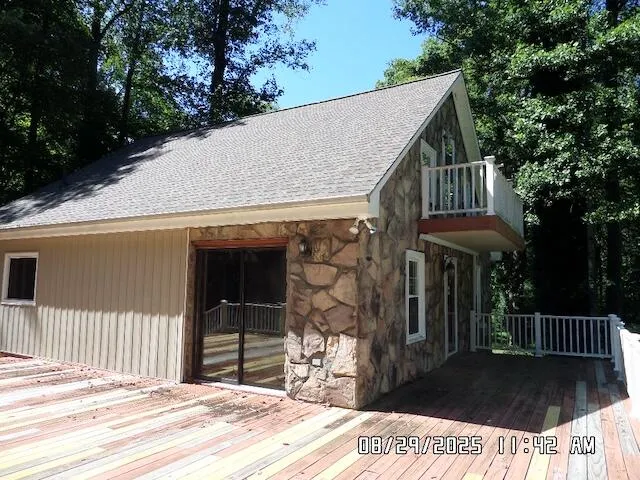a view of a house with a small yard