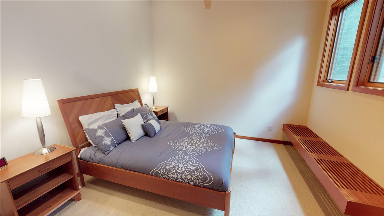 12998 Timber Ridge Road Truckee, CA 96161 - Photo 12 of 20 a bedroom with a bed and a window