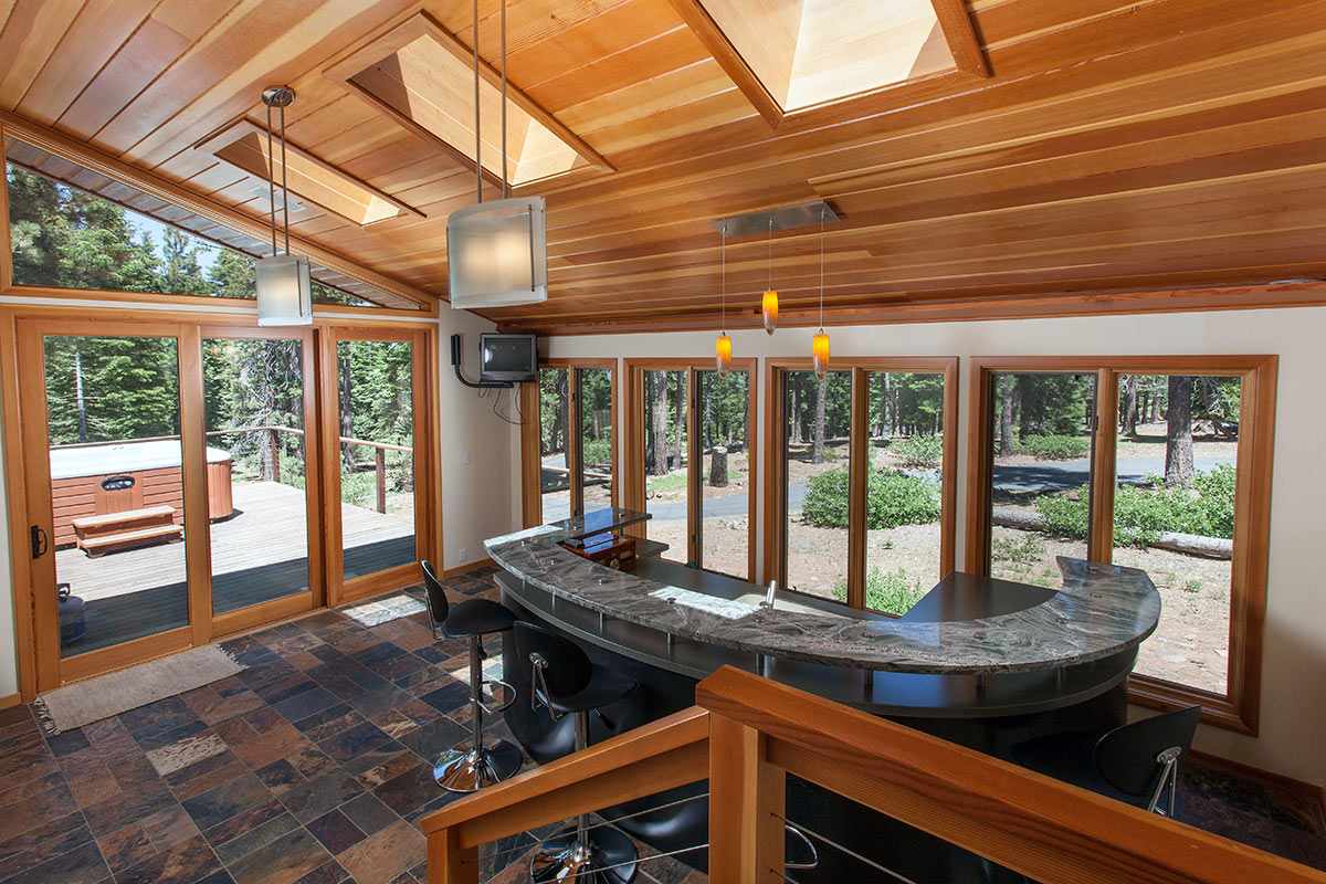 12998 Timber Ridge Road Truckee, CA 96161 - Photo 6 of 20 a room with furniture and large windows