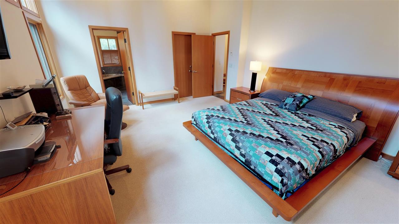 12998 Timber Ridge Road Truckee, CA 96161 - Photo 8 of 20 a bed sitting in a bedroom next to a window