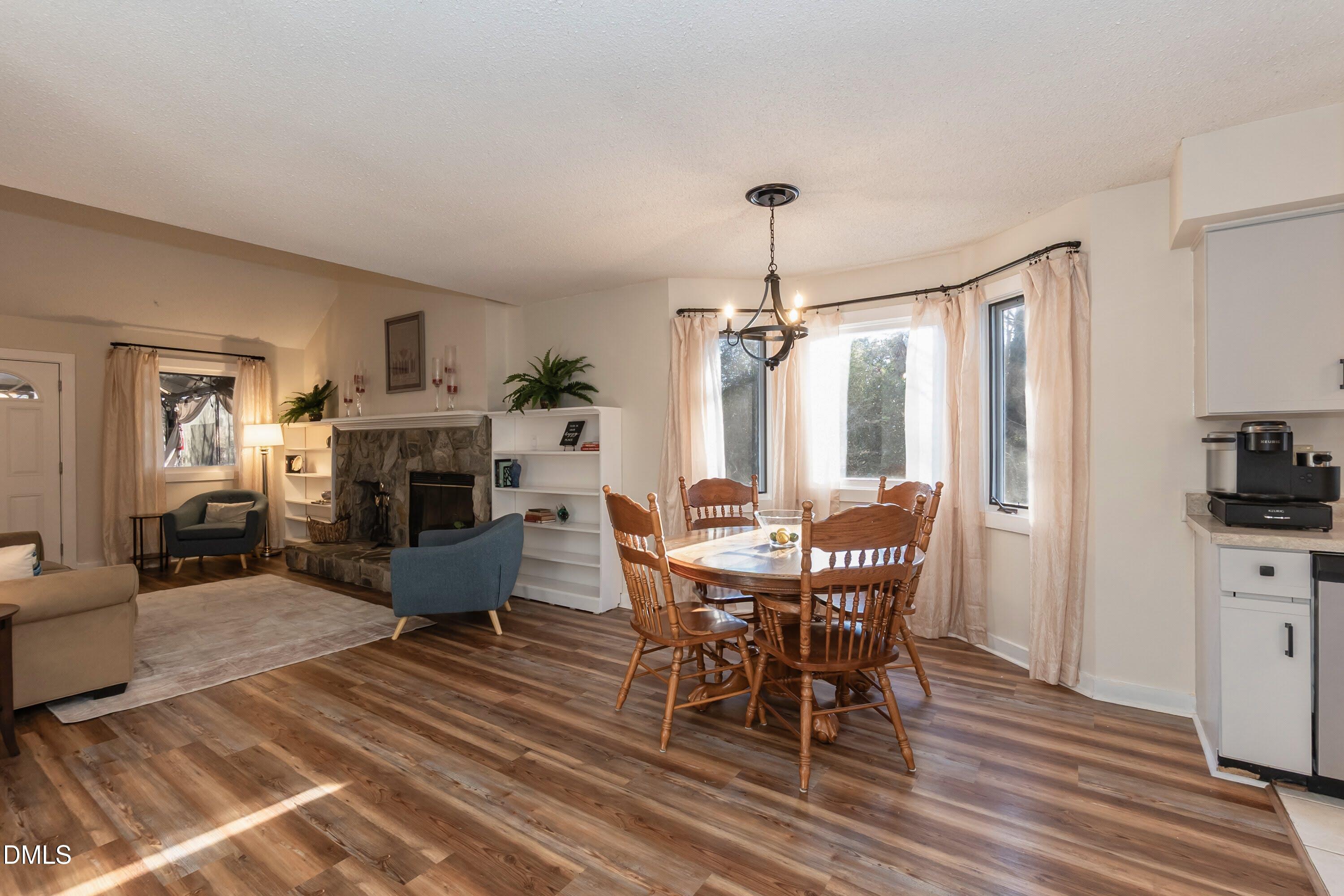 3600 Top Of The Pines Court Raleigh, NC 27604 - Photo 19 of 45 a view of a dining room with furniture window and wooden floor