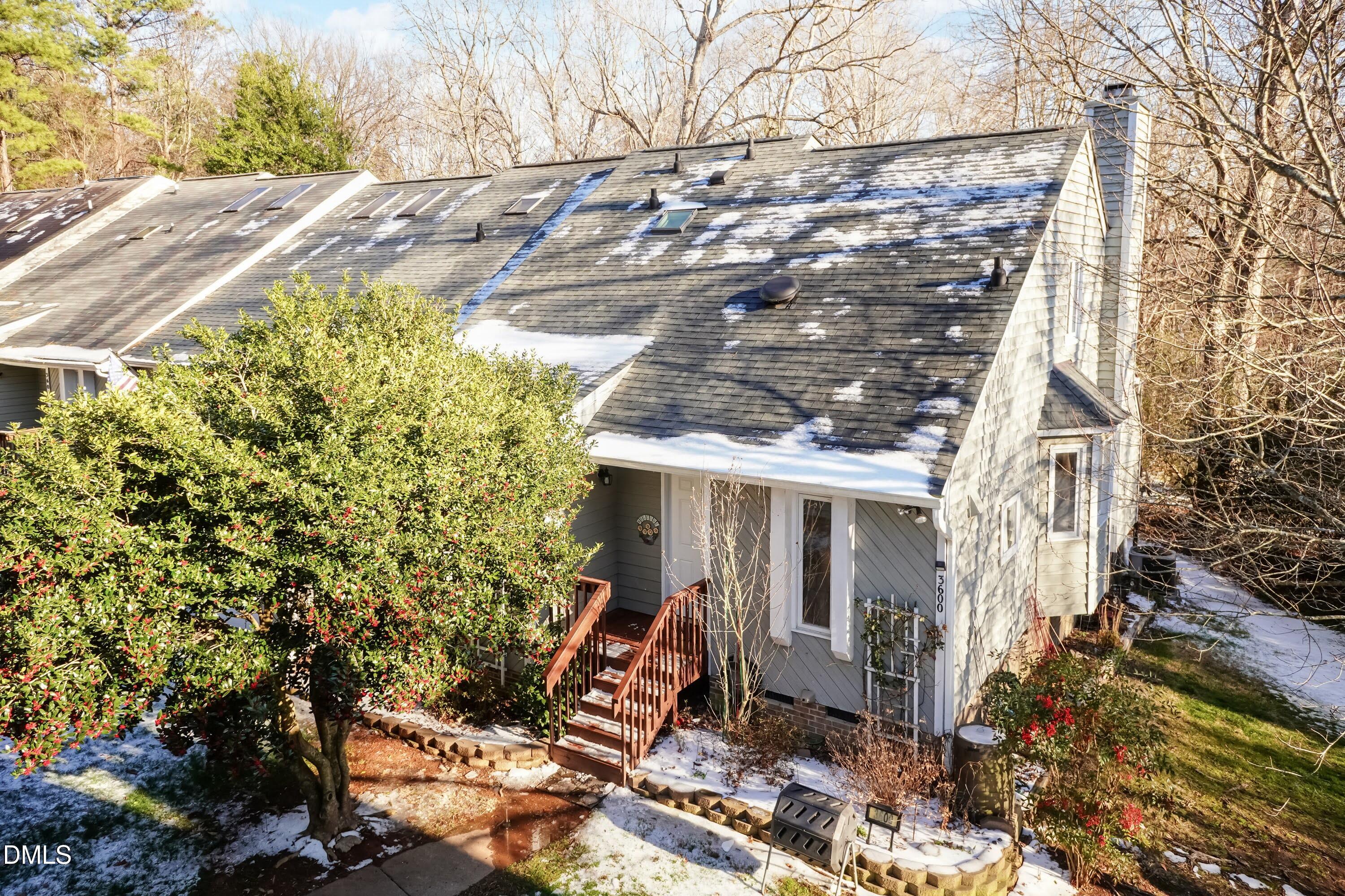 3600 Top Of The Pines Court Raleigh, NC 27604 - Photo 3 of 45 a view of a house with a tree in the background