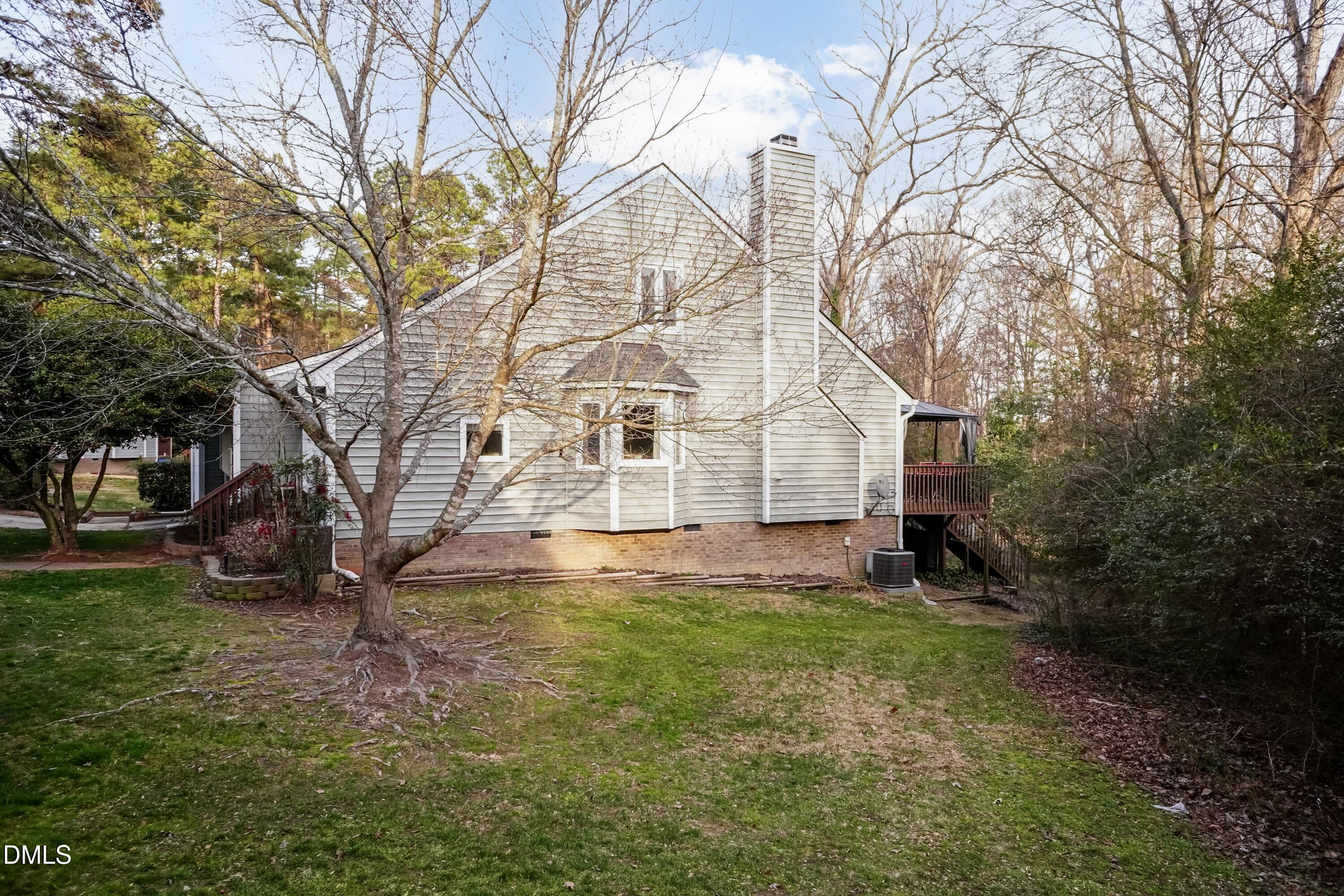 3600 Top Of The Pines Court Raleigh, NC 27604 - Photo 38 of 45 a view of a house with a yard