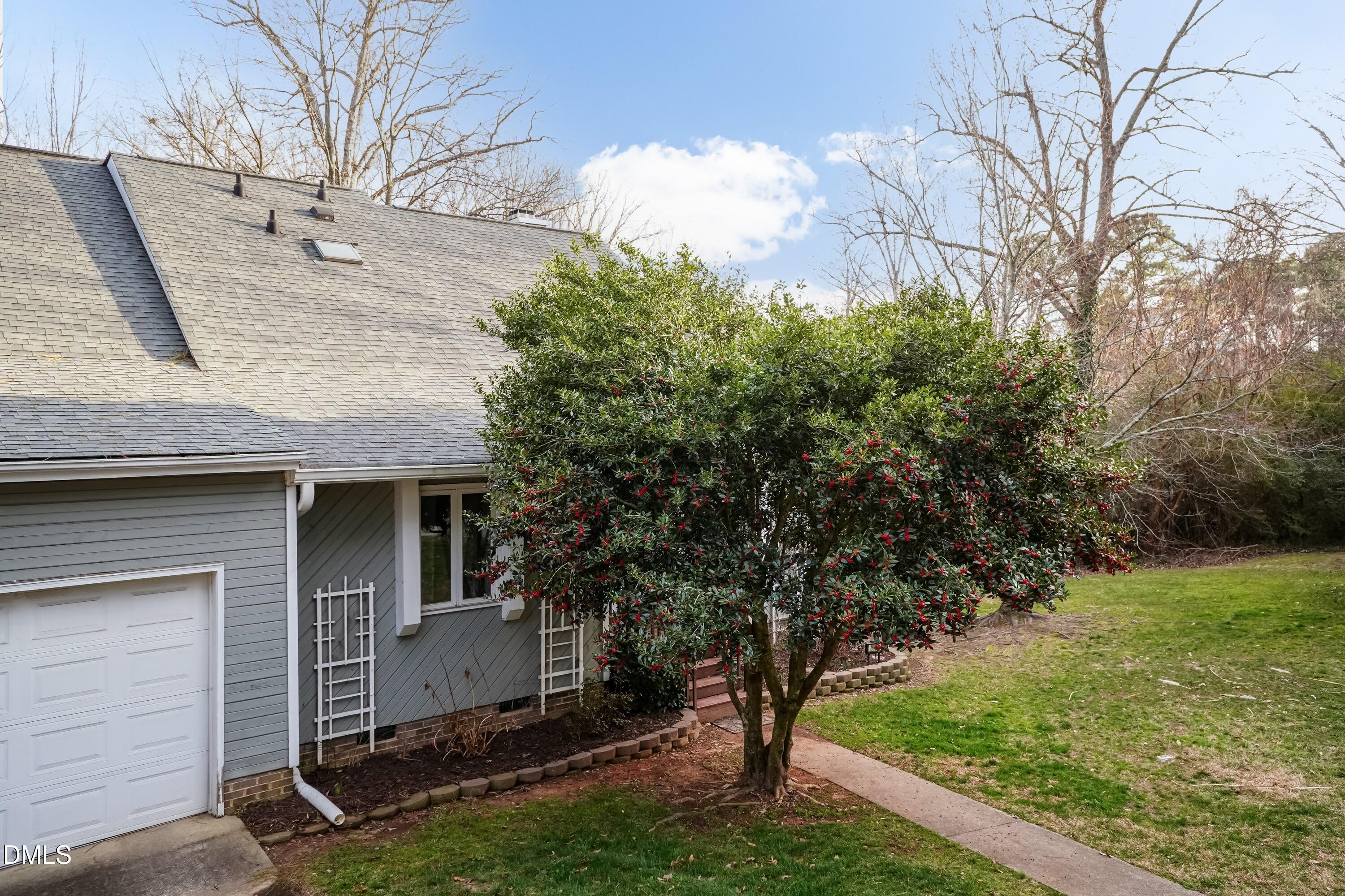 3600 Top Of The Pines Court Raleigh, NC 27604 - Photo 4 of 45 a view of a house with a yard