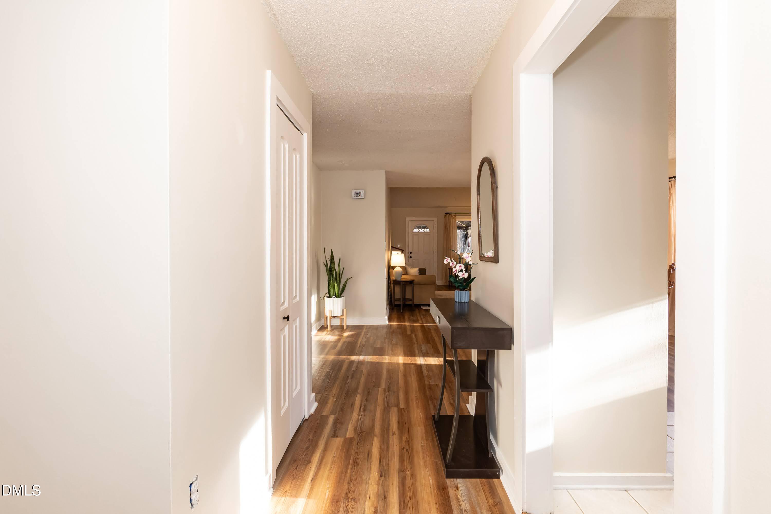3600 Top Of The Pines Court Raleigh, NC 27604 - Photo 6 of 45 a view of a living room with a bed
