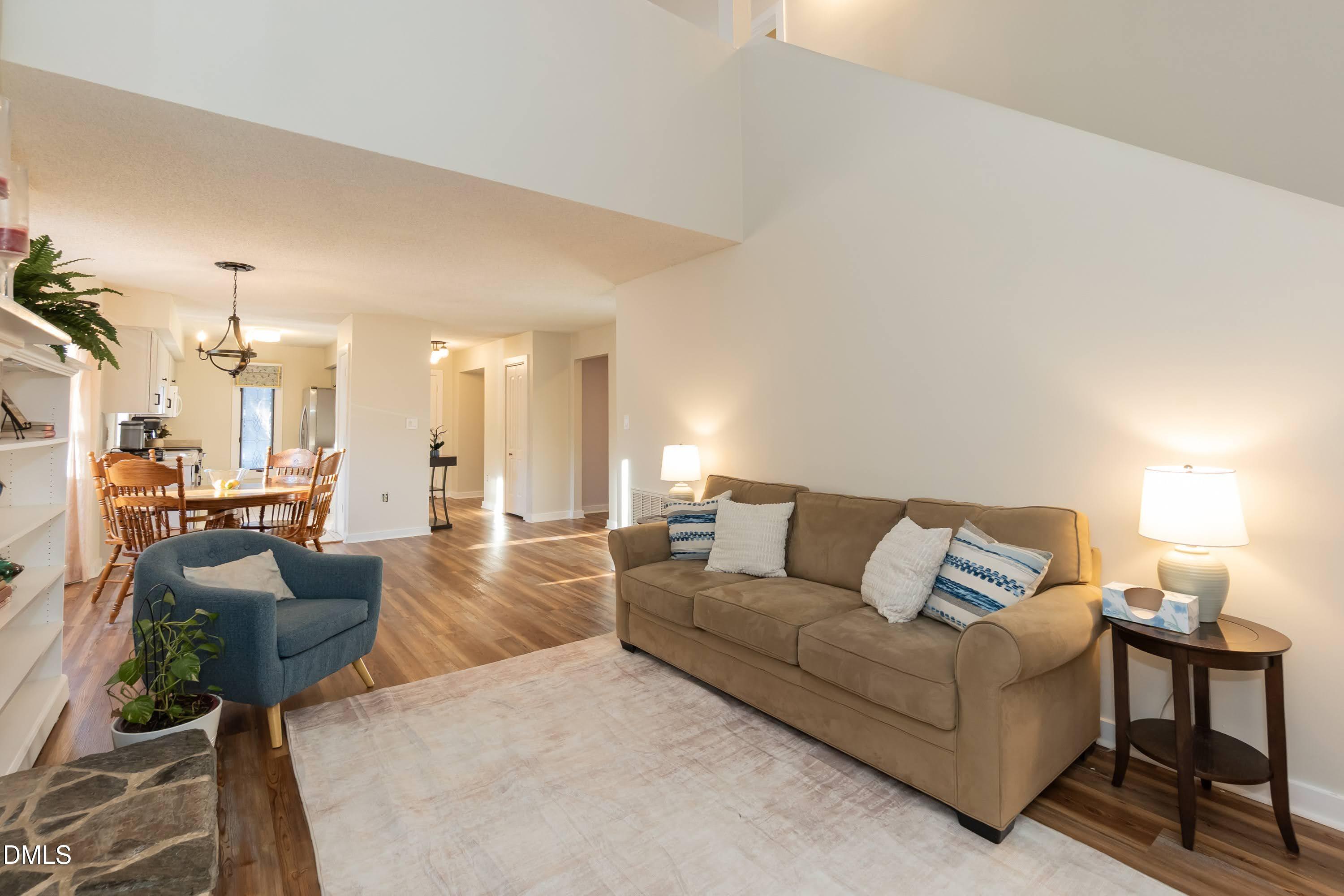 3600 Top Of The Pines Court Raleigh, NC 27604 - Photo 10 of 45 a living room with furniture and a large mirror
