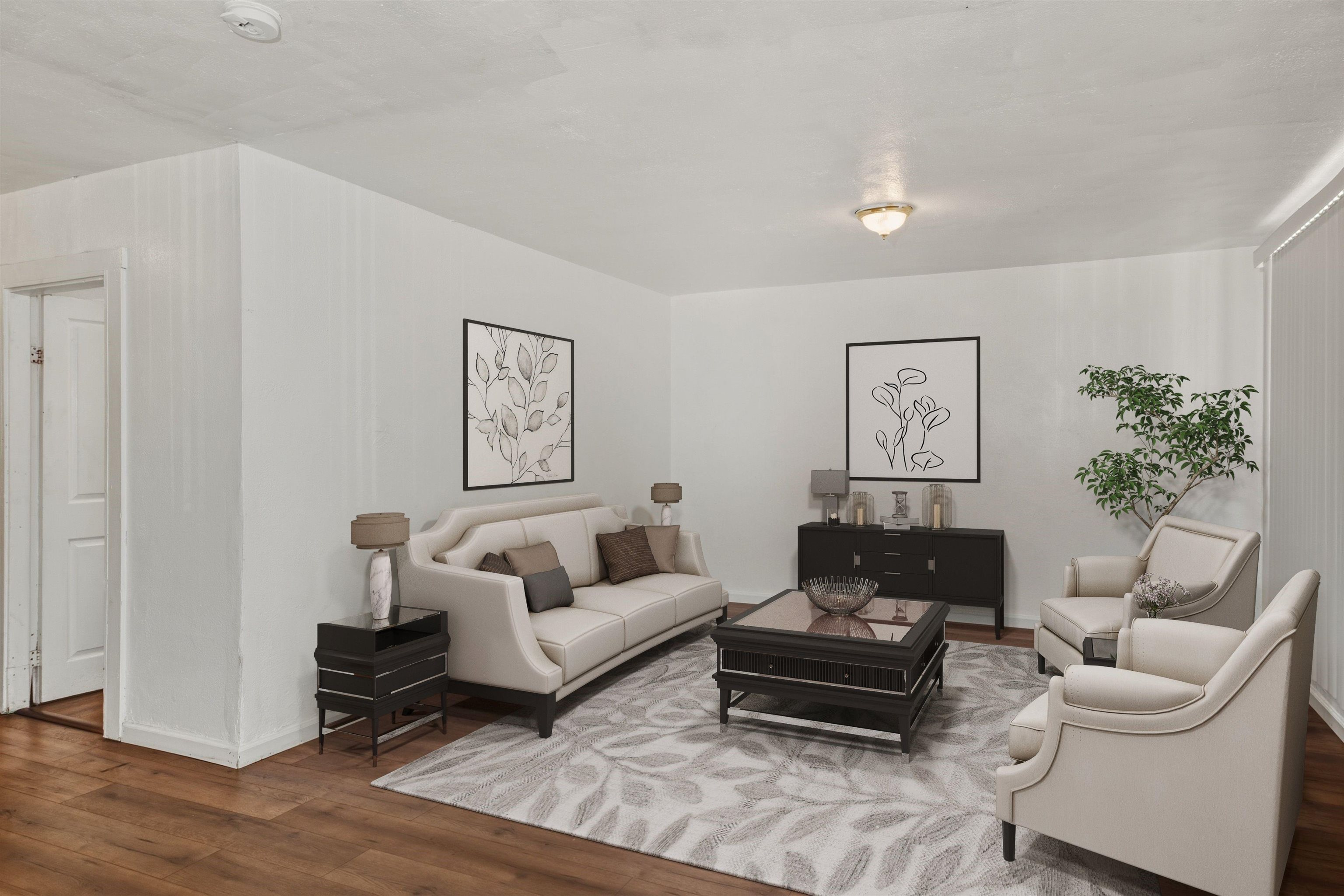 1111 Campbell Street Oakland, CA 94607 - Photo 4 of 17 a living room with furniture and a potted plant