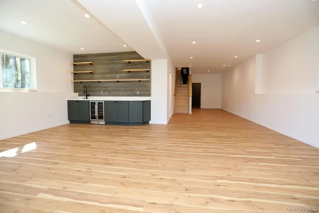 a view of kitchen and wooden floor
