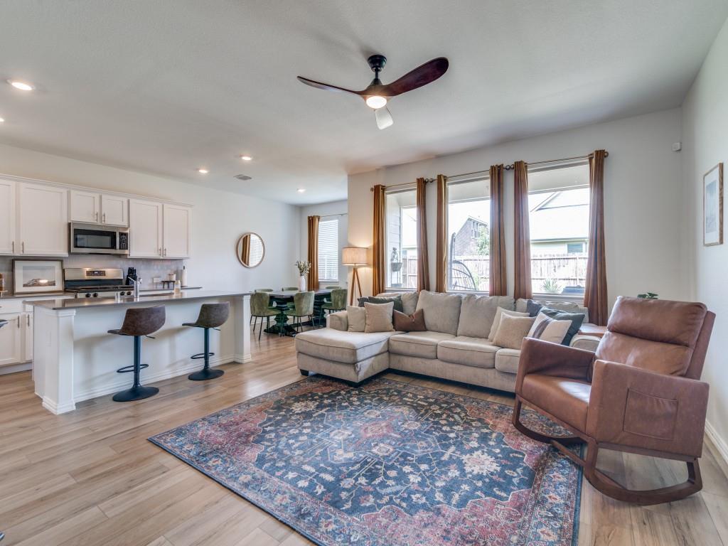 656 Beltrand Lane Fate, TX 75087 - Photo 4 of 22 Open concept between the living area and kitchen is great for entertaining