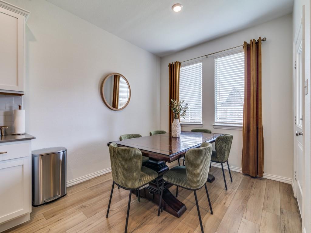 656 Beltrand Lane Fate, TX 75087 - Photo 7 of 22 Dining area has plenty of natural light
