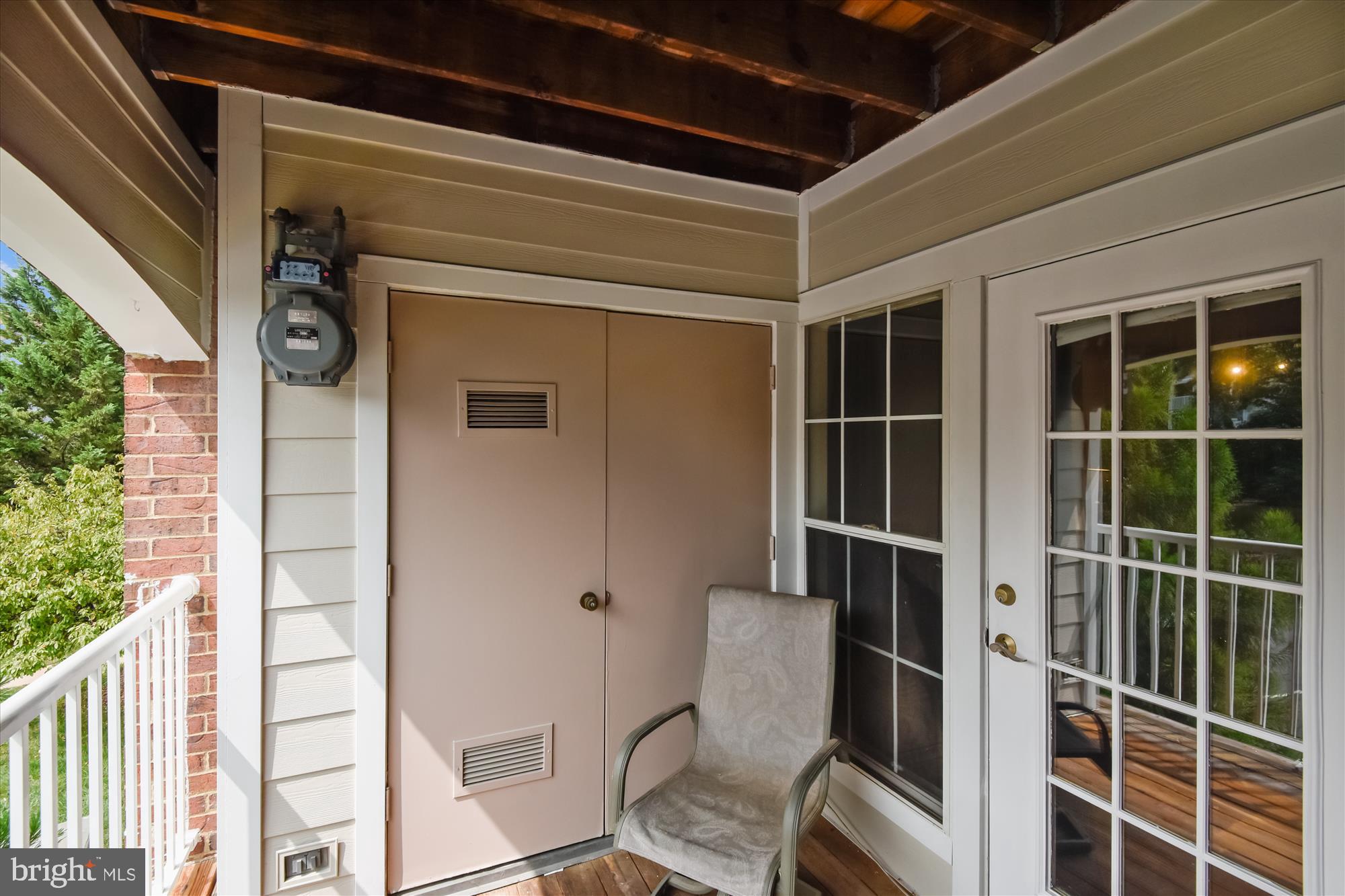 20979 Timber Ridge Terrace, Unit 204 Ashburn, VA 20147 - Photo 18 of 29 a view of chair in the balcony