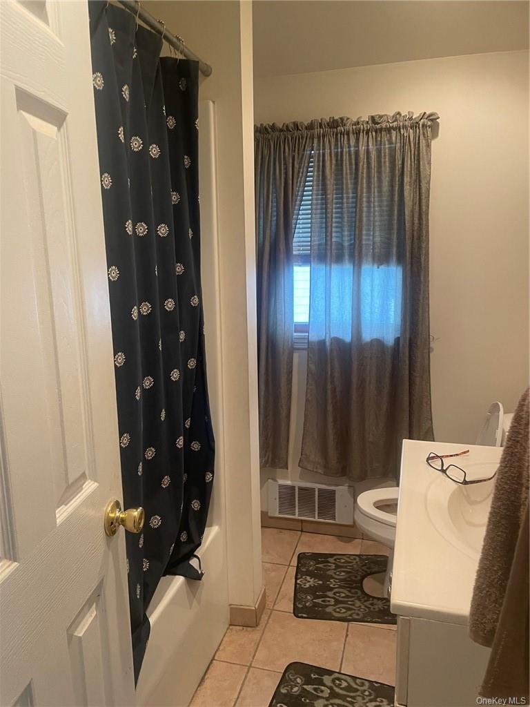 100 Dunderberg Road Putnam Valley, NY 10579 - Photo 17 of 29 a bathroom with a toilet and a shower