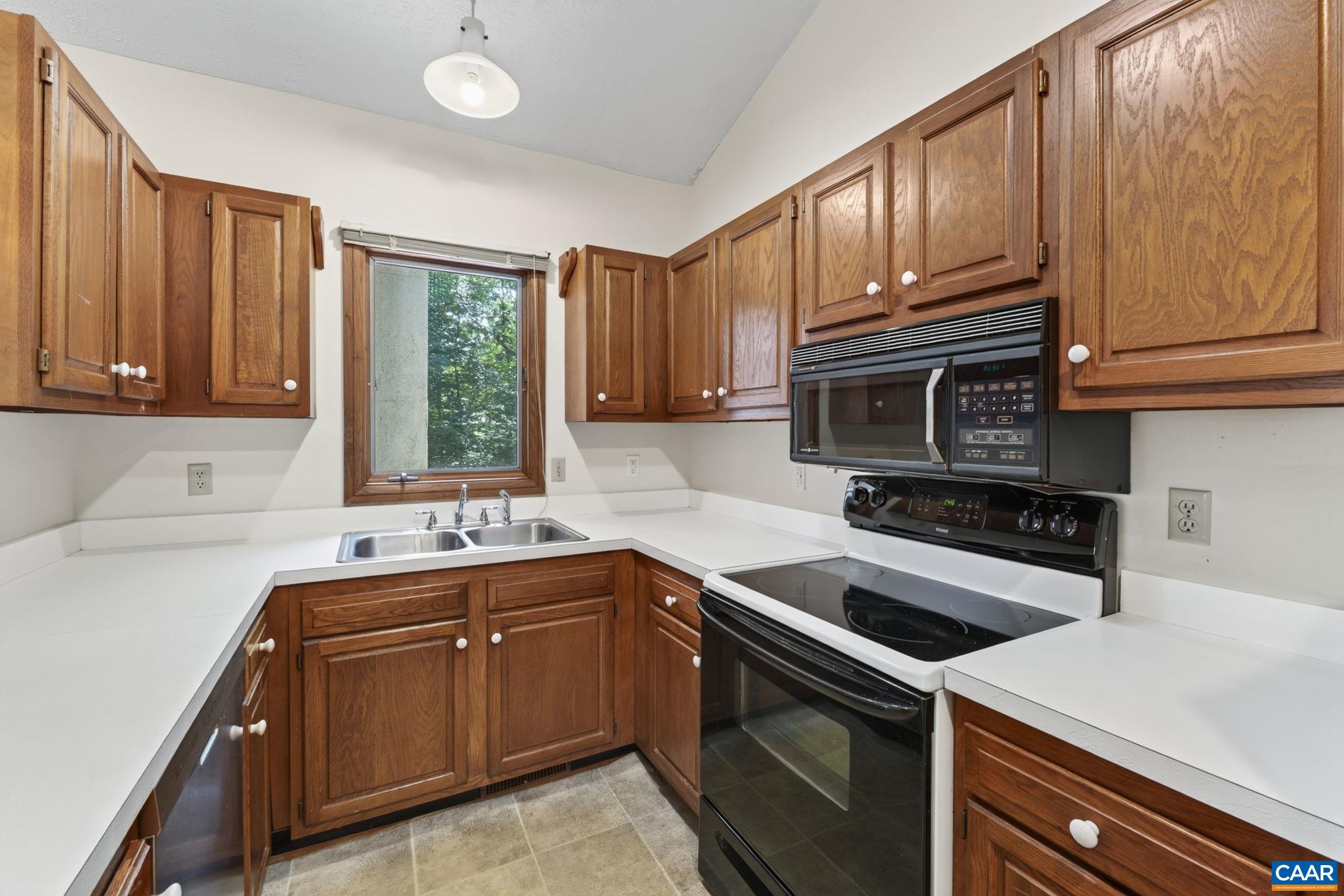 9 Timberlake Terrace Palmyra, VA 22963 - Photo 10 of 35 a kitchen with a sink stove top oven and cabinets