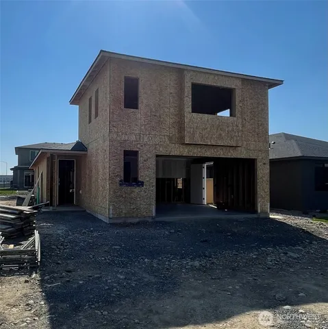 a front view of a house with yard