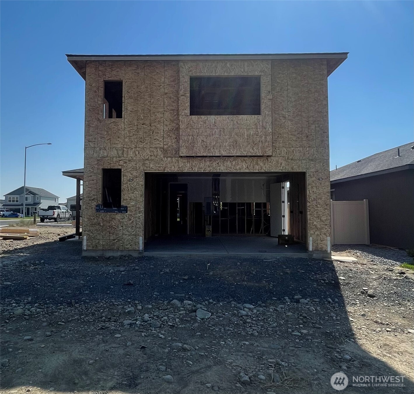 1012 Northeast 9th Avenue Ephrata, WA 98823 - Photo 2 of 8 a front view of a house with a yard