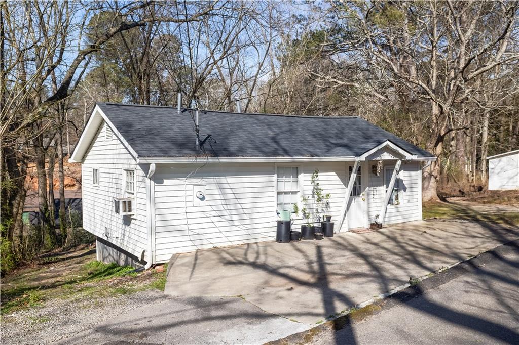 70 Daisy Circle Canton, GA 30114 - Photo 2 of 2 a view of a house with a snow on the road