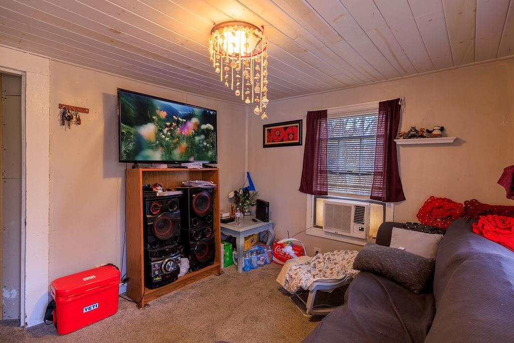 70 Daisy Circle Canton, GA 30114 - Photo 3 of 12 a living room with furniture and a flat screen tv