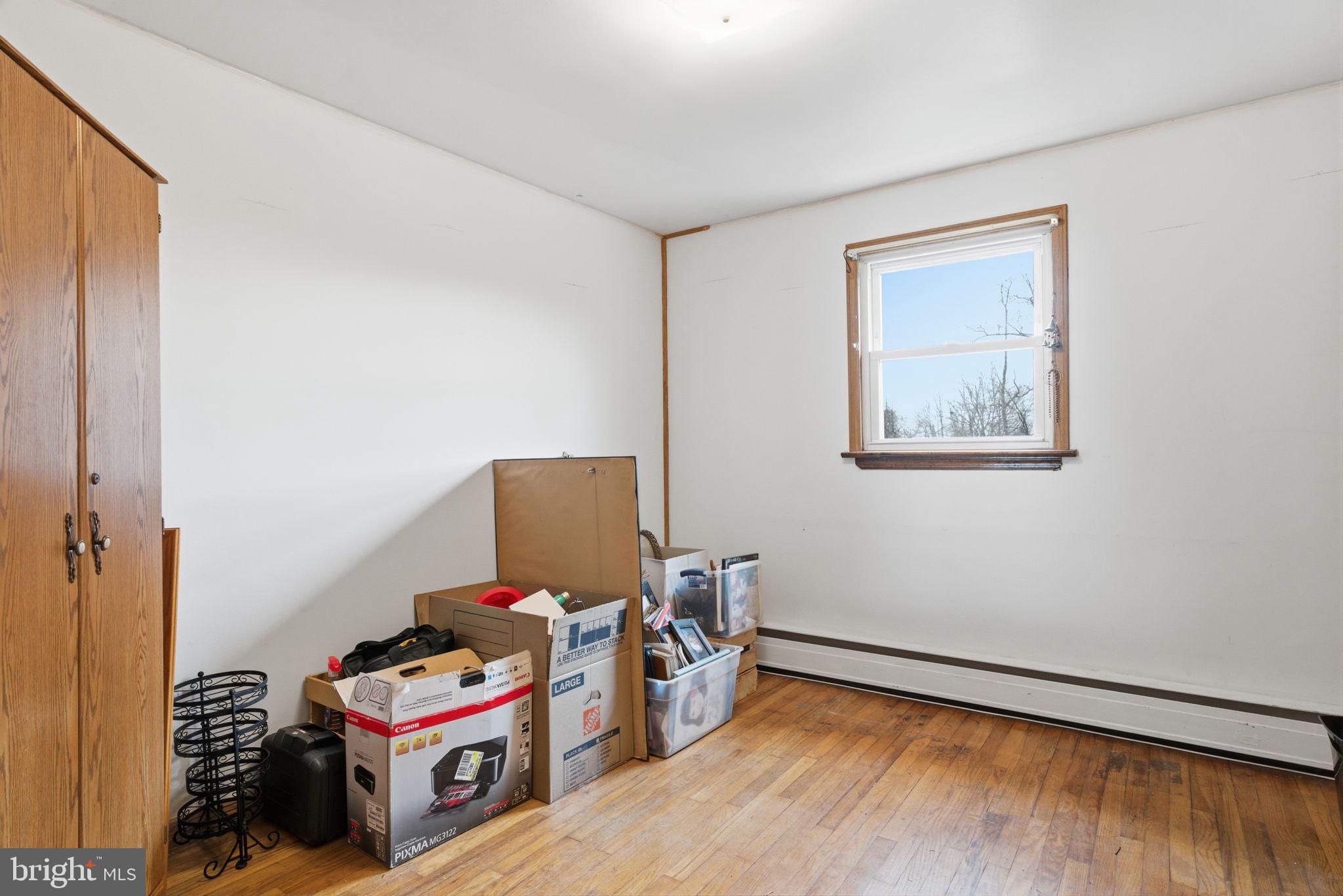 3517 Bristol Road Bensalem, PA 19020 - Photo 15 of 35 a room with furniture and wooden floor