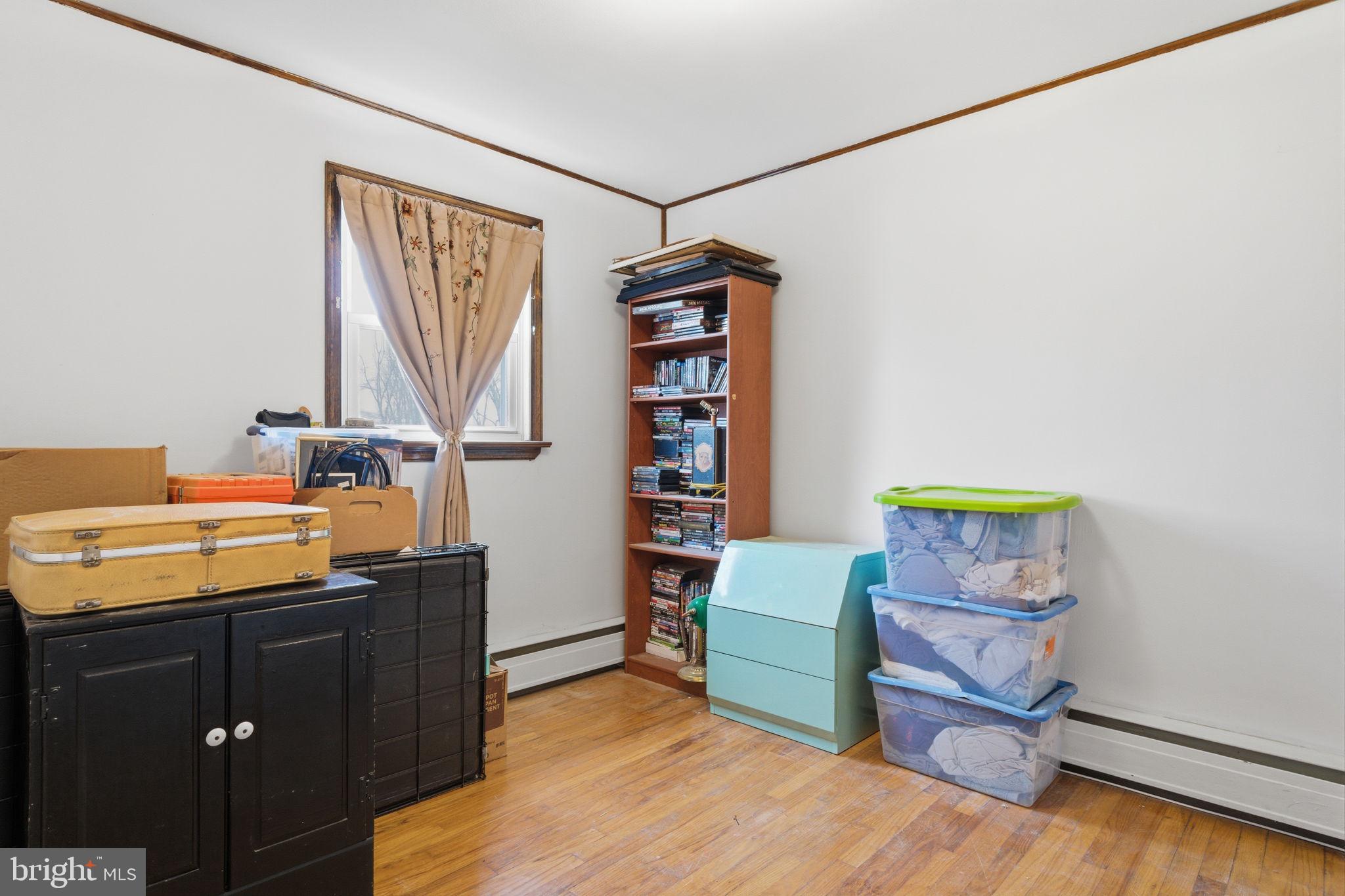3517 Bristol Road Bensalem, PA 19020 - Photo 16 of 35 a room with furniture and wooden floor