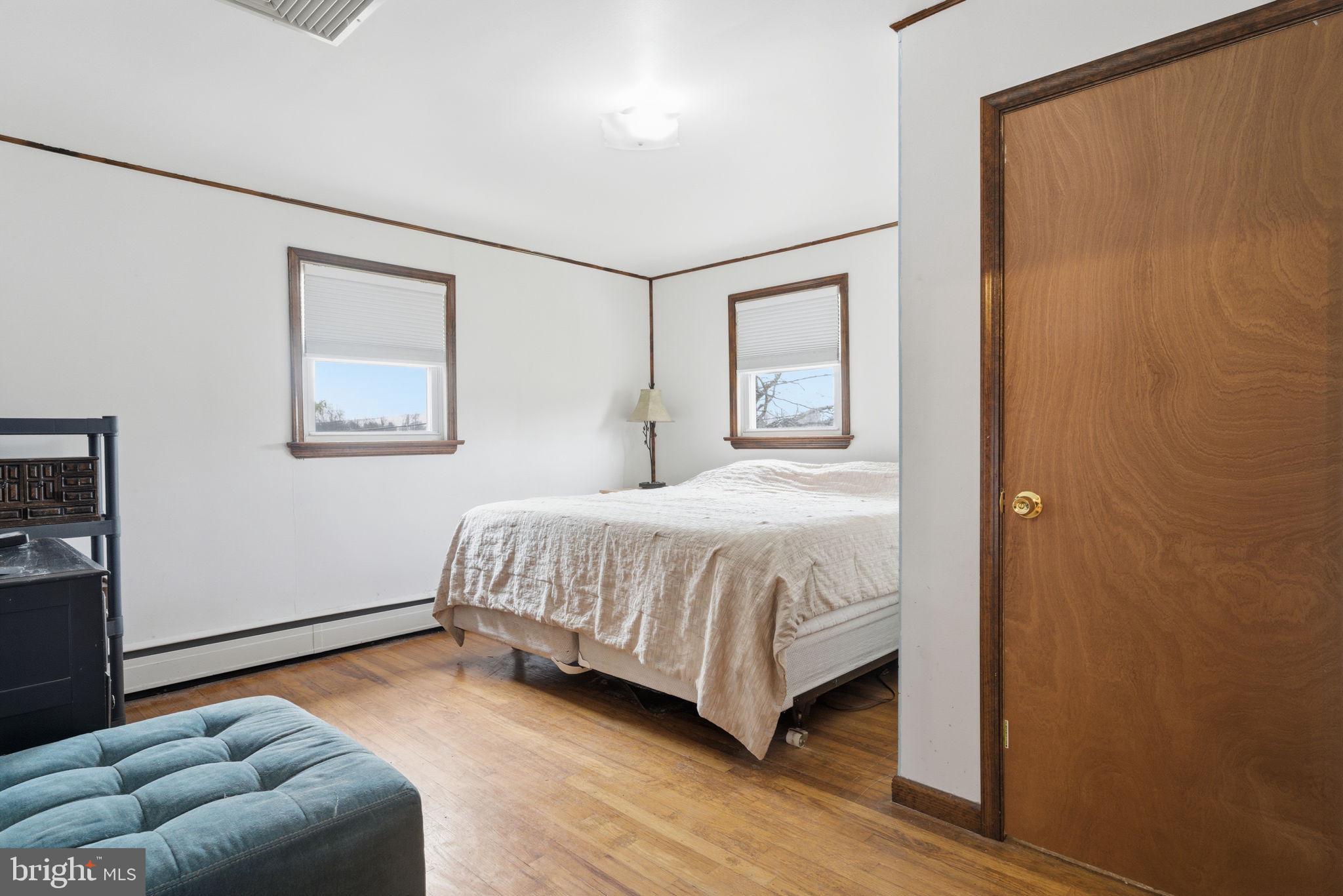 3517 Bristol Road Bensalem, PA 19020 - Photo 17 of 35 a bedroom with a bed and a couch