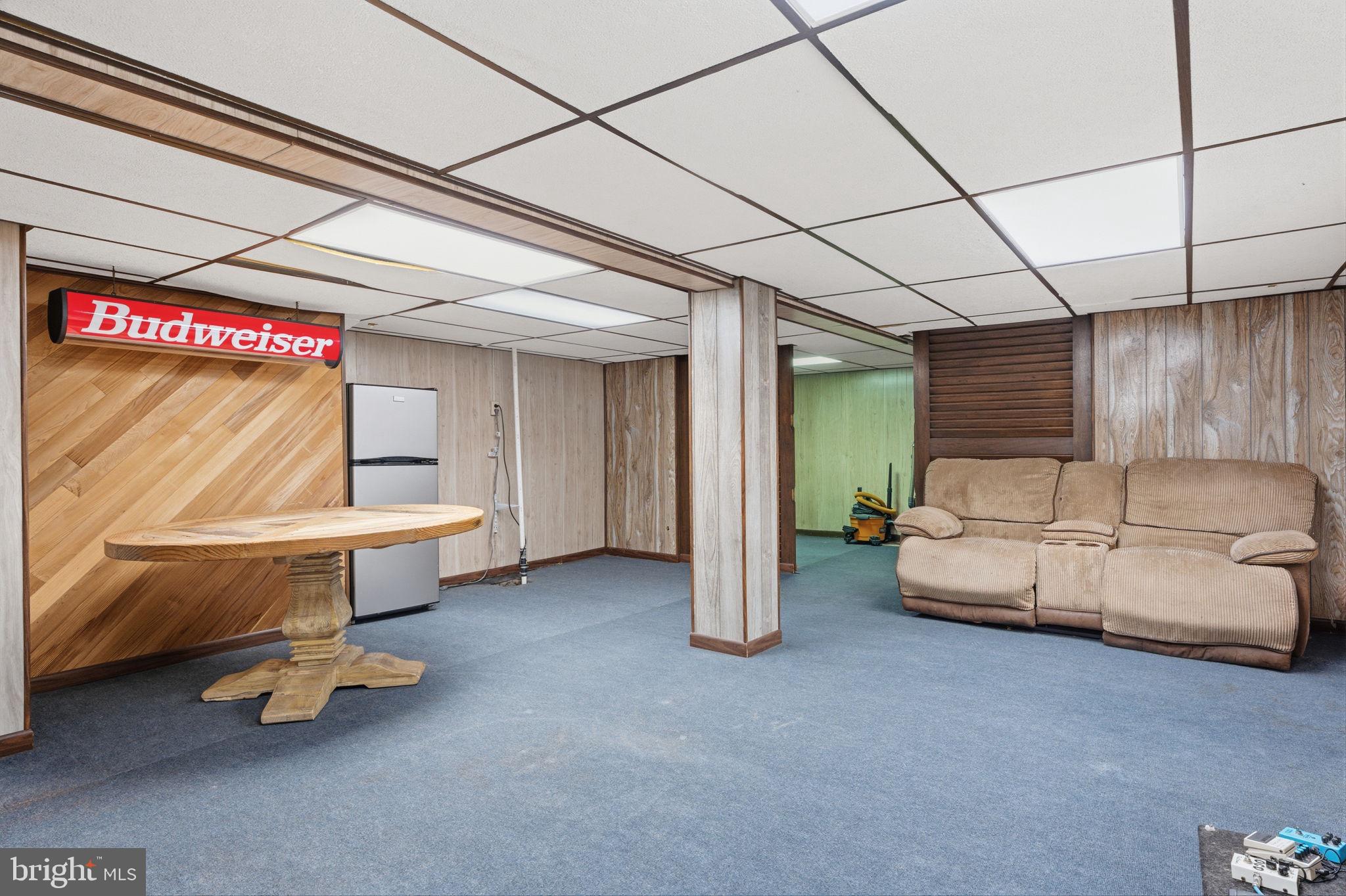 3517 Bristol Road Bensalem, PA 19020 - Photo 26 of 35 a living room with furniture and a chandelier