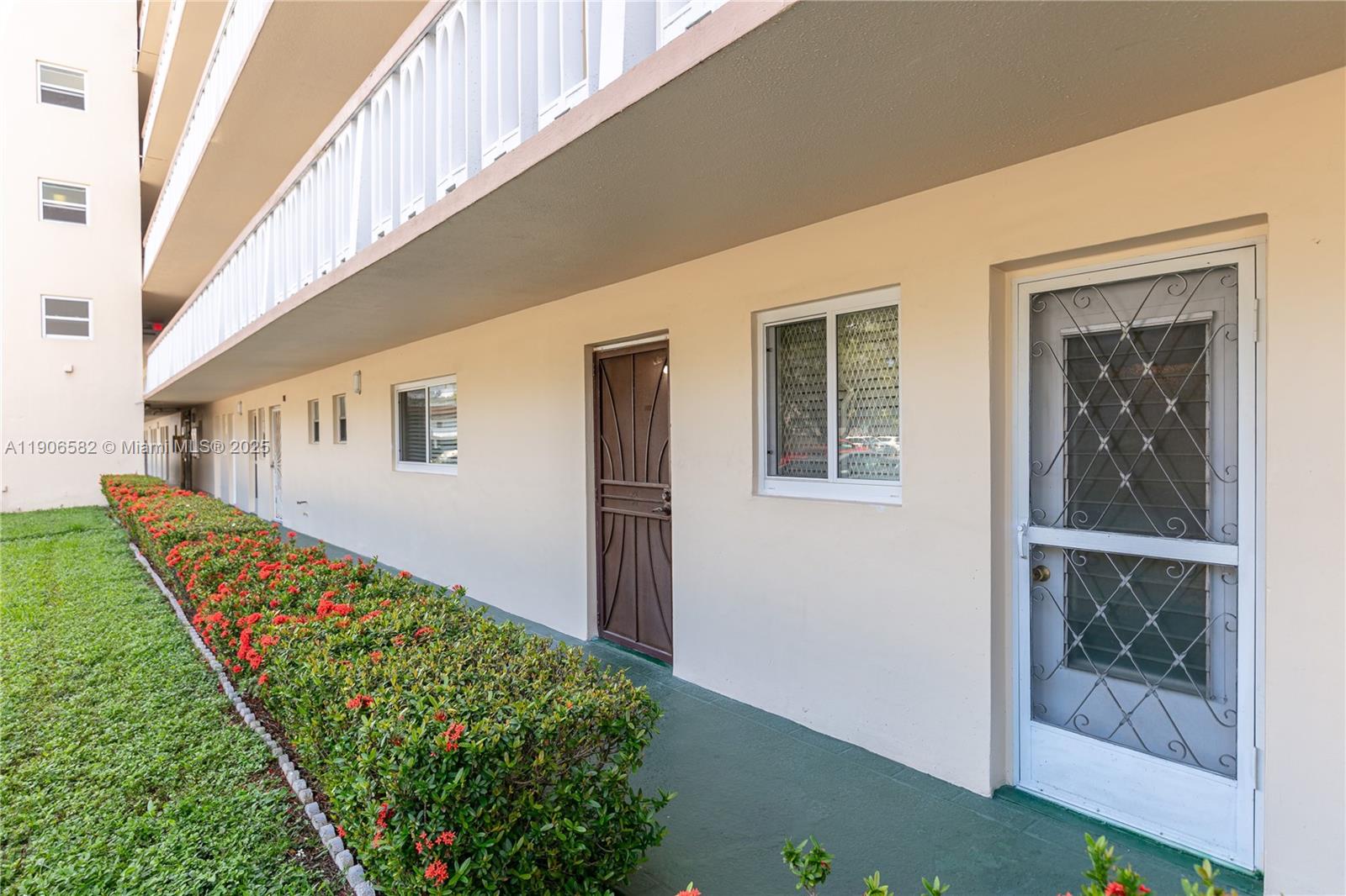 1001 Northeast 14th Avenue, Unit 107 Hallandale Beach, FL 33009 - Photo 27 of 28 a front view of a house with balcony