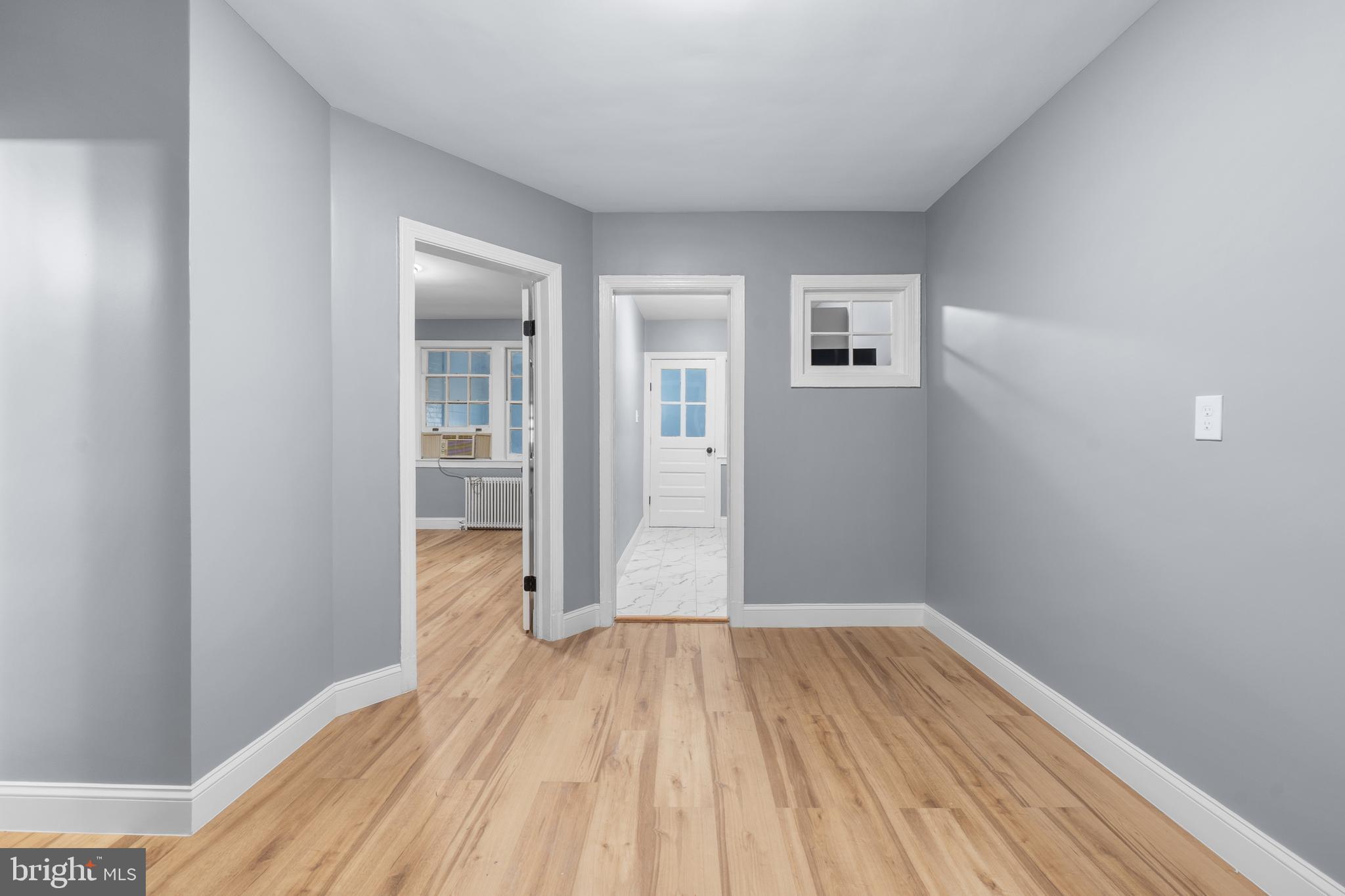 1721 29th Street Southeast, Unit 1 Washington, DC 20020 - Photo 10 of 24 a view of a room with wooden floor