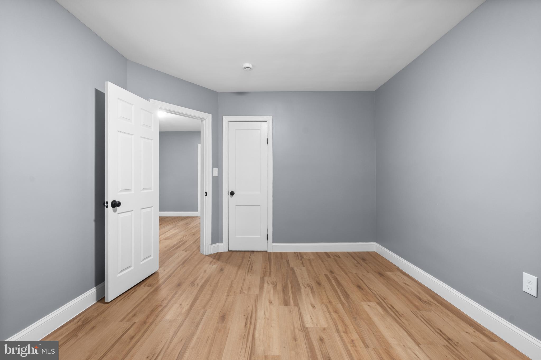 1721 29th Street Southeast, Unit 1 Washington, DC 20020 - Photo 12 of 24 a view of a room with wooden floor