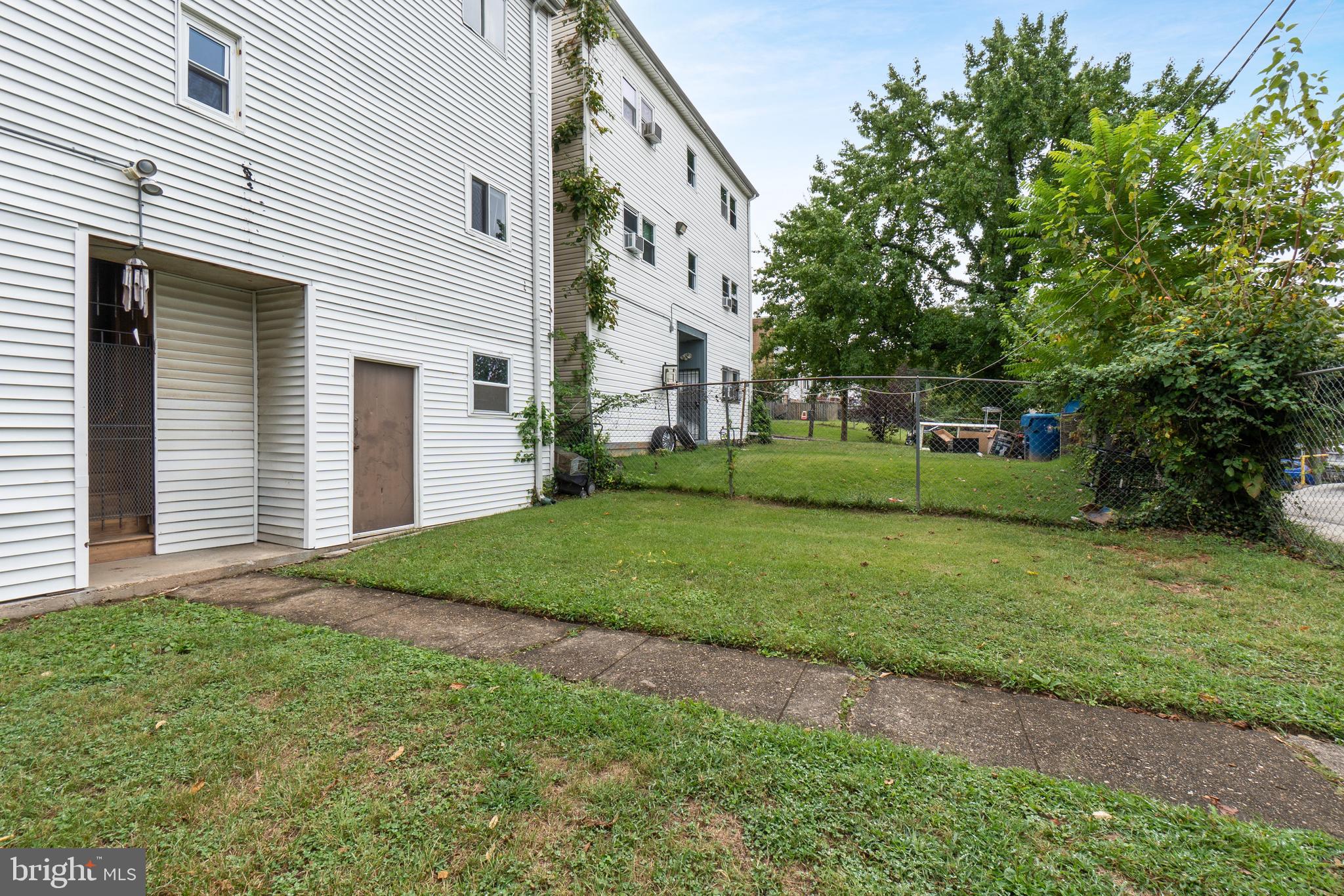 1721 29th Street Southeast, Unit 1 Washington, DC 20020 - Photo 21 of 24 a view of a house with a yard