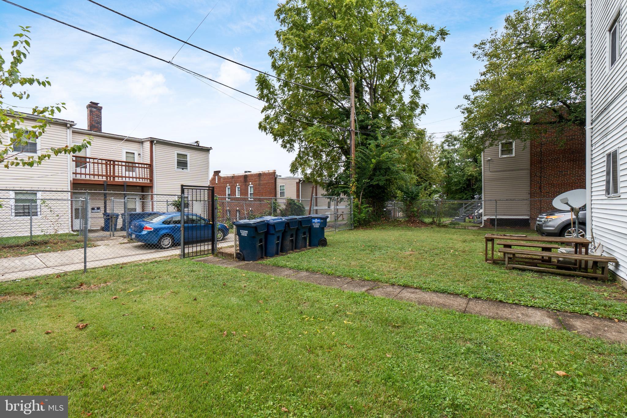 1721 29th Street Southeast, Unit 1 Washington, DC 20020 - Photo 22 of 24 a view of a house with backyard sitting area and garden