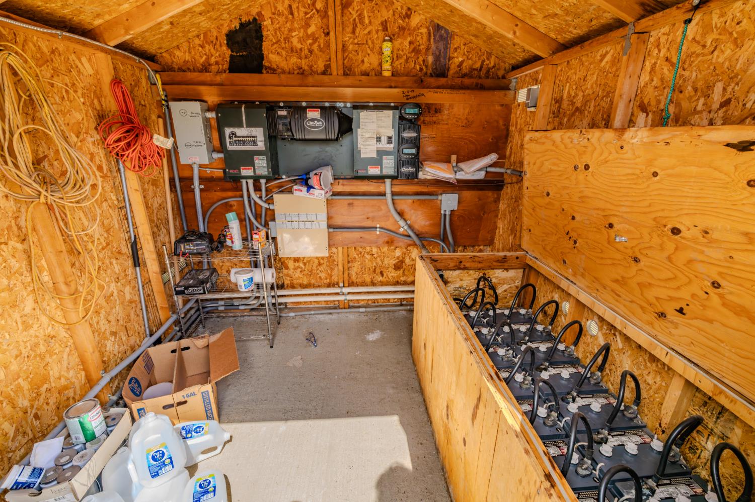 3155 Hawver Road San Andreas, CA 95249 - Photo 60 of 63 Inside the storage shed that houses the 16 deep cell batteries and conversion system.