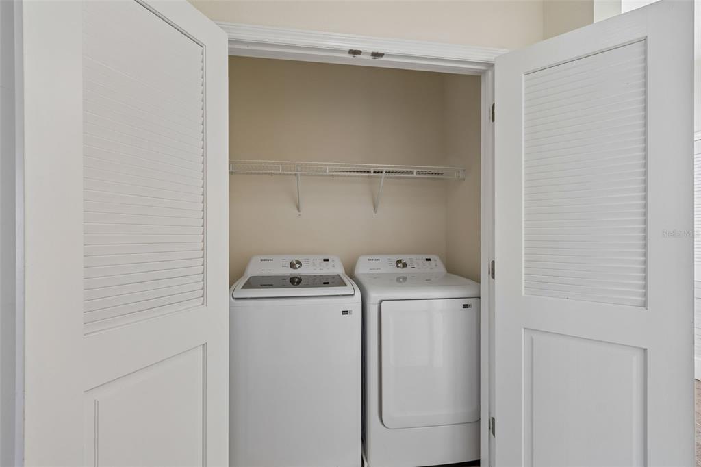 2322 West Chestnut Street Tampa, FL 33607 - Photo 19 of 27 a utility room with dryer and washer