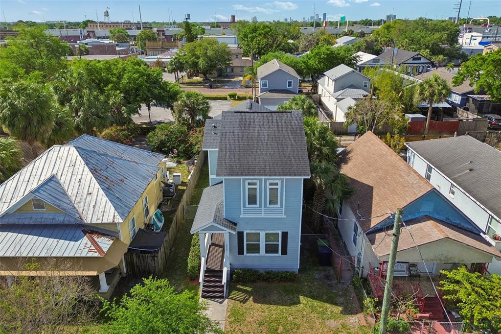2322 West Chestnut Street Tampa, FL 33607 - Photo 23 of 27 an aerial view of house with yard and mountain view in back