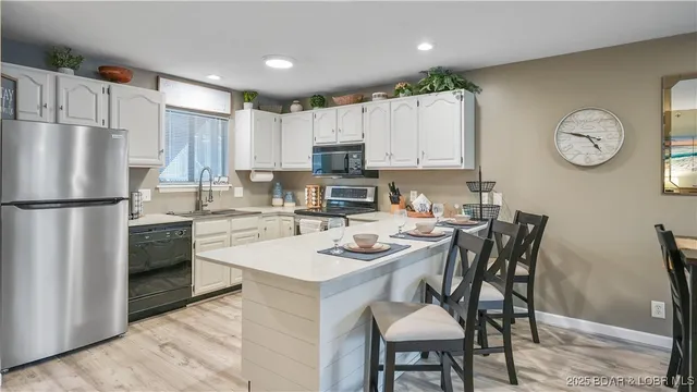 $295,000 | 611 Lazy Days Road, Unit V6, Osage Beach, MO 65065