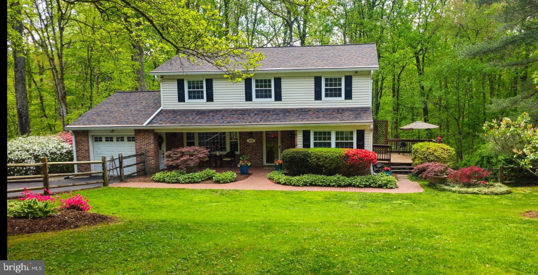 7946 Helmart Drive Laurel, MD 20723 - Photo 2 of 50 Mid Spring with azaleas in bloom