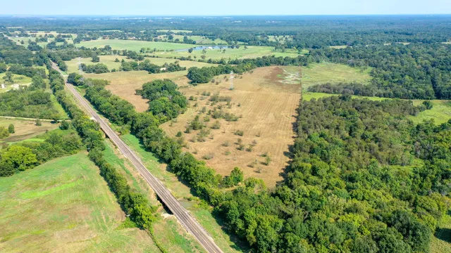 a view of lake with green space