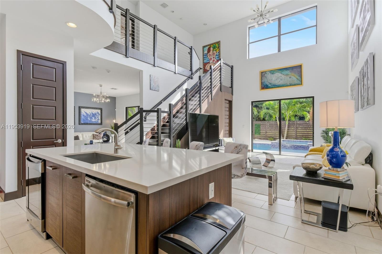 16044 Southwest 136 Way Miami, FL 33196 - Photo 13 of 64 a living room with furniture and a large window