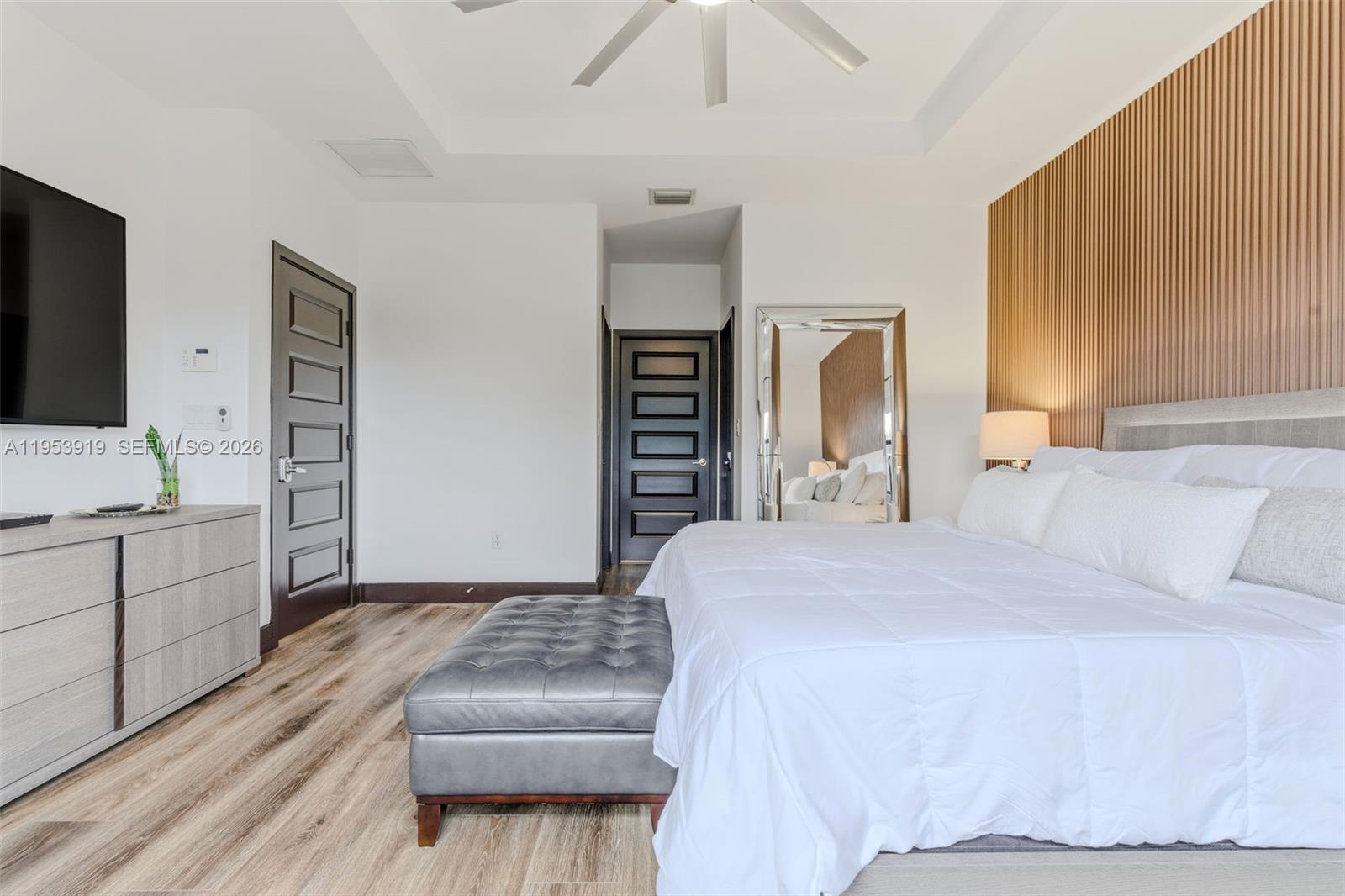 16044 Southwest 136 Way Miami, FL 33196 - Photo 25 of 64 a bedroom with a bed and a dresser