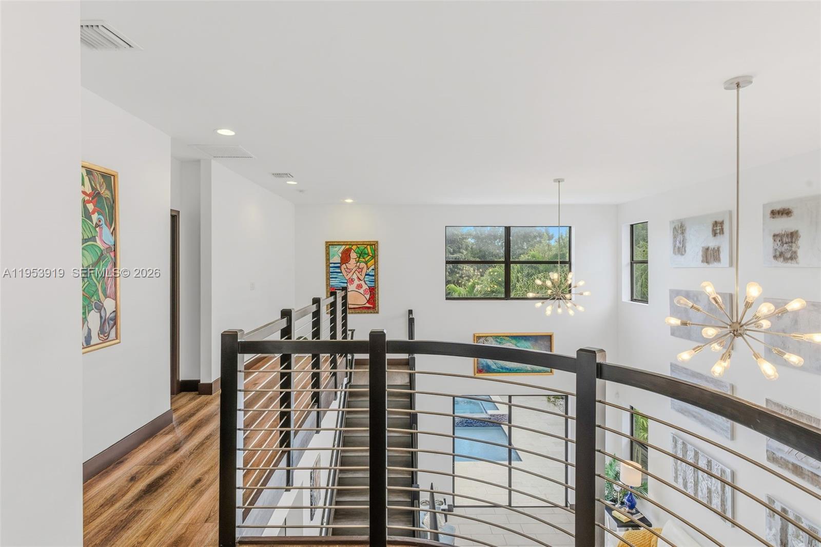 16044 Southwest 136 Way Miami, FL 33196 - Photo 37 of 64 a view of a living room and dining room