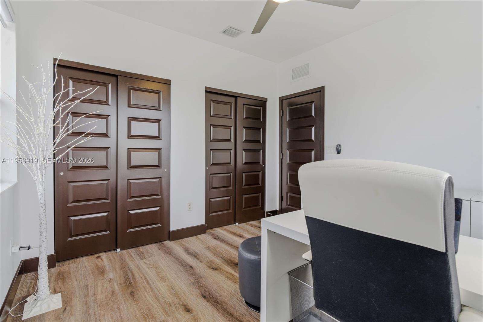 16044 Southwest 136 Way Miami, FL 33196 - Photo 46 of 64 a bedroom with a bed and a closet