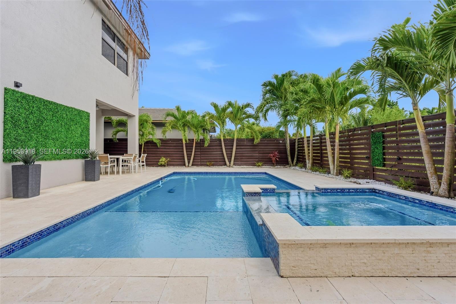 16044 Southwest 136 Way Miami, FL 33196 - Photo 51 of 64 a view of outdoor space yard deck patio and swimming pool