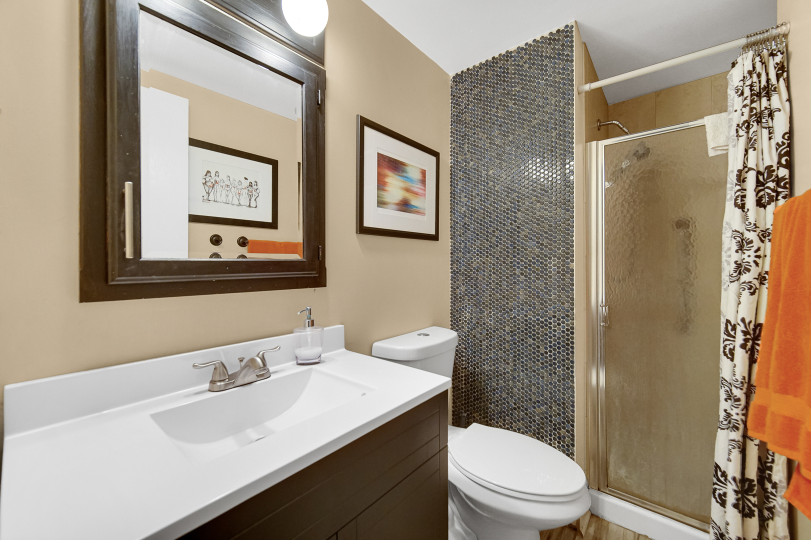 18443 Maple Street Lansing, IL 60438 - Photo 11 of 20 a bathroom with a toilet a sink and a mirror