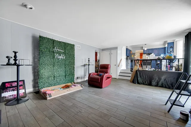 a living room with furniture and a couch