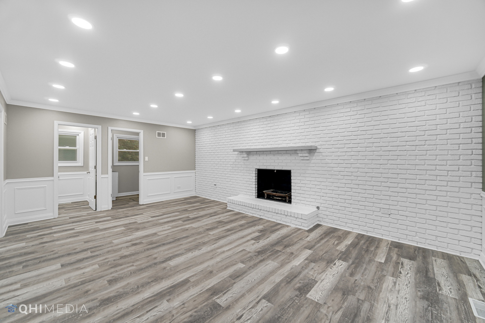 Undisclosed Address Olympia Fields, IL 60461 - Photo 14 of 38 a view of empty room with wooden floor and fireplace