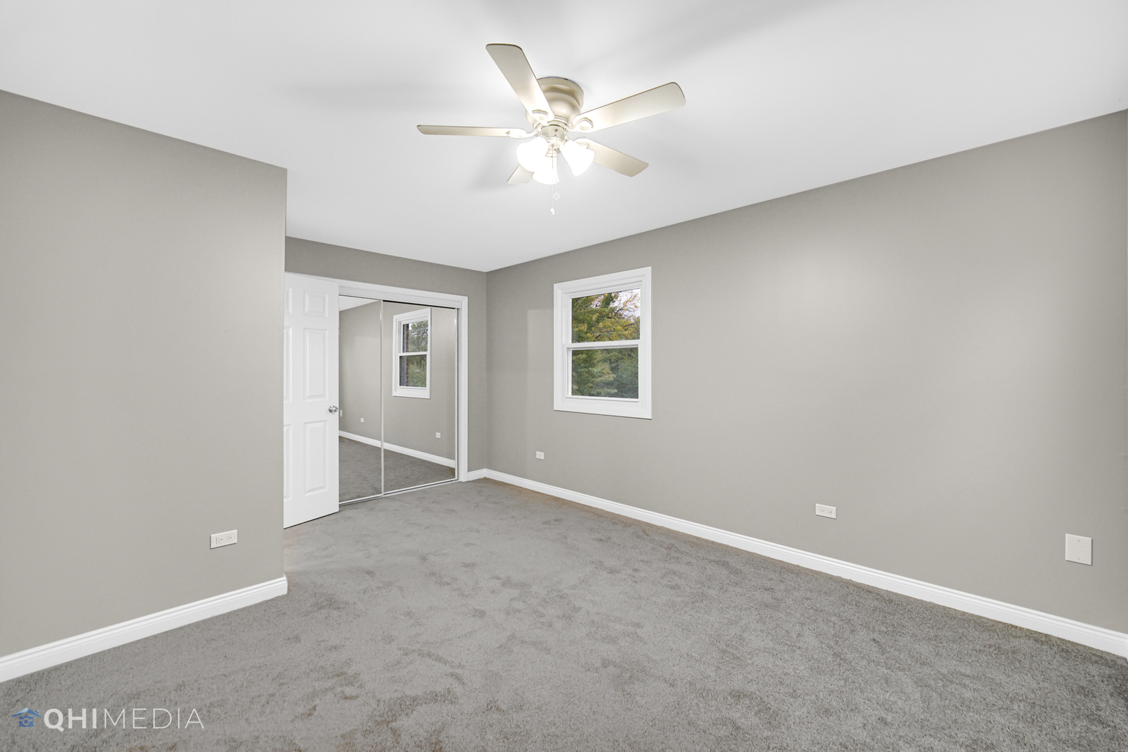 Undisclosed Address Olympia Fields, IL 60461 - Photo 25 of 38 an empty room with fan and windows