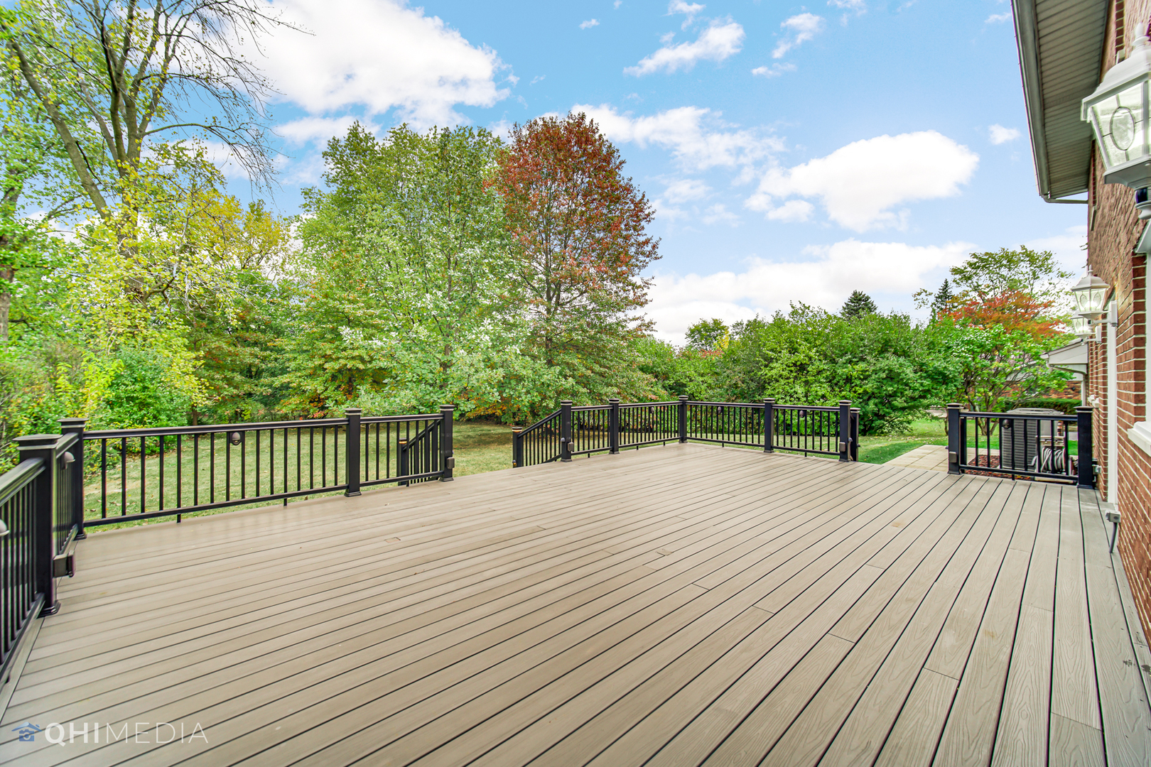 Undisclosed Address Olympia Fields, IL 60461 - Photo 3 of 38 a view of a balcony with wooden floor and fence
